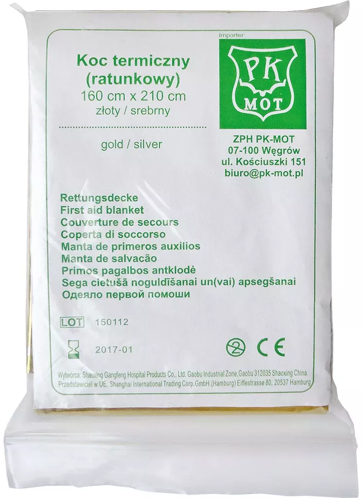 Koc termiczny (ratunkowy) o wymiarach 160 cm x 210 cm, srebrny, wielojęzyczny opis produktu. Opakowanie białe z zielonymi akcentami i symbolami CE.