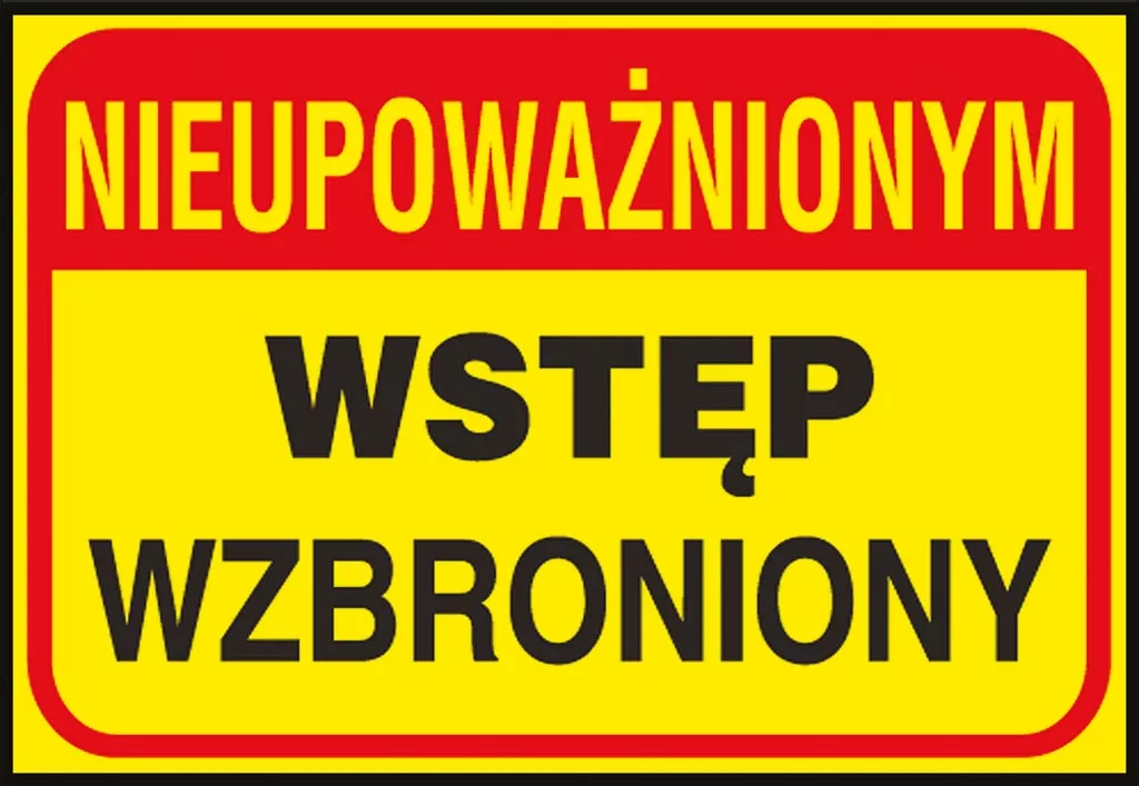 Tablica ostrzegawcza o żółtym tle z czarnymi i czerwonymi napisami, informująca 