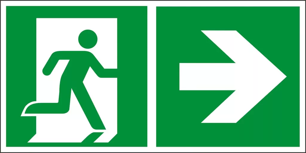 Znak bezpieczeństwa przedstawiający zielony symbol osoby wychodzącej przez drzwi oraz strzałkę wskazującą kierunek na prawo, używany do oznaczania wyjścia ewakuacyjnego.