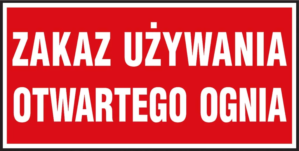 Prostokątny czerwony znak z białymi napisami 