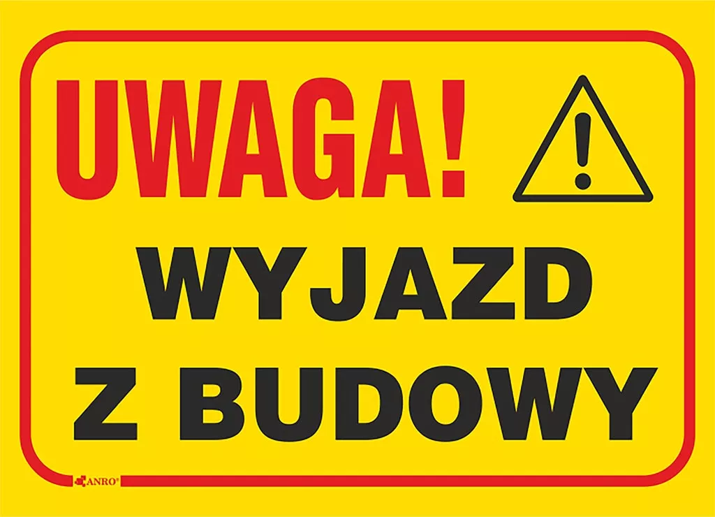 Żółta tablica budowlana z czerwonym napisem 