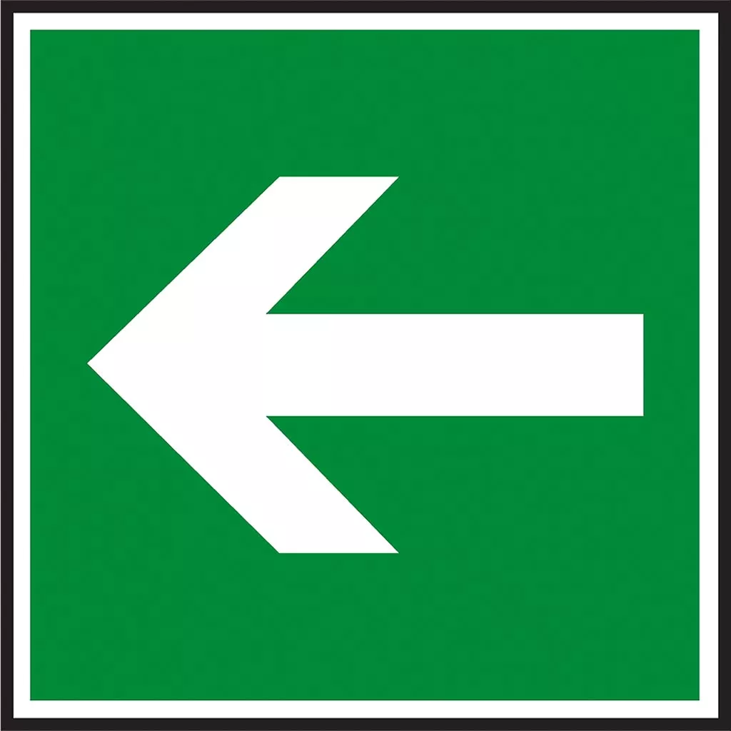Znak ewakuacyjny na zielonym tle, z białą strzałką skierowaną w lewo, wskazujący kierunek drogi ewakuacyjnej.