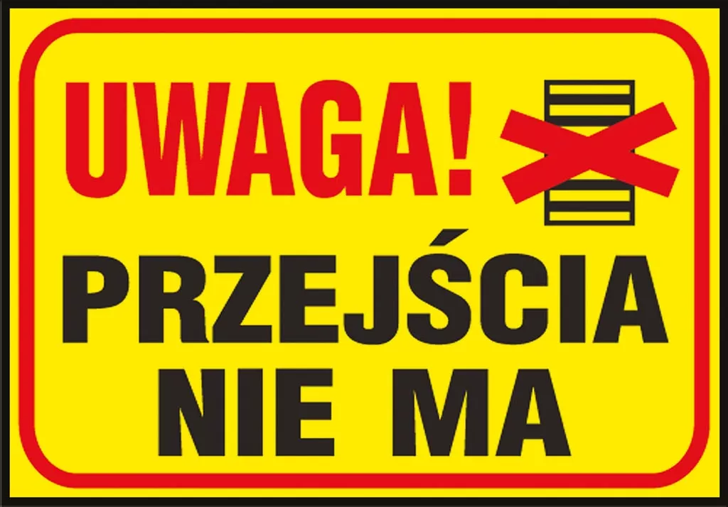 Żółta tablica z czerwoną ramką i napisem 