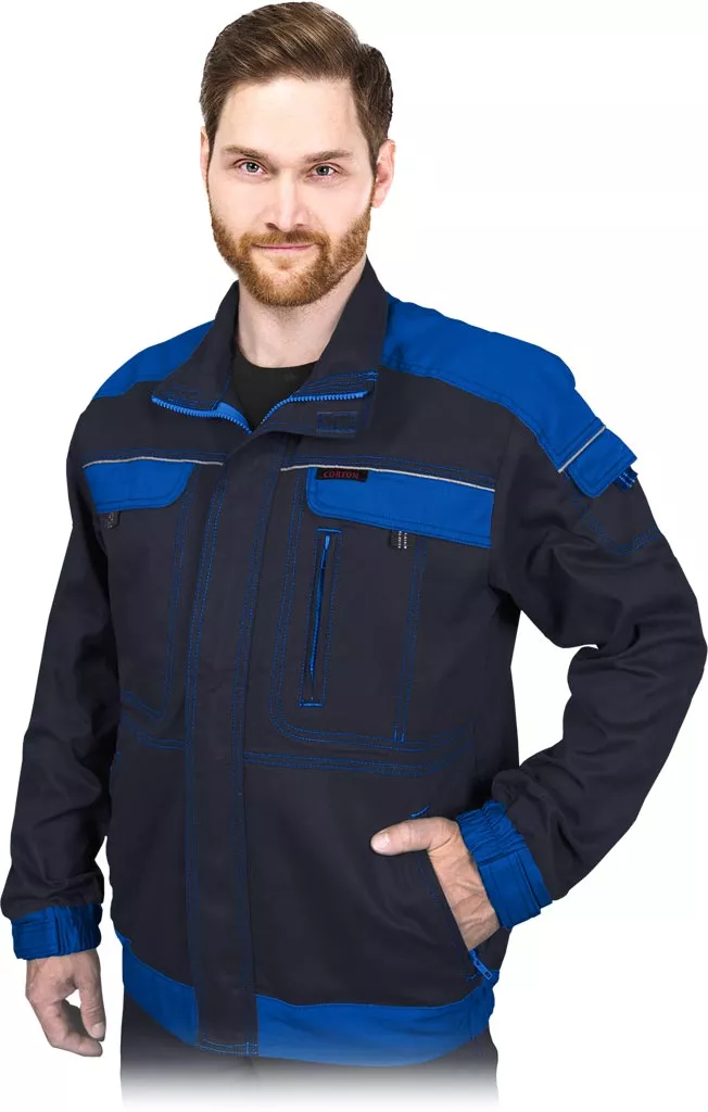 Męska bluza robocza CORTON katana, granatowa z niebieskimi wstawkami, wykonana w 100% z bawełny. Posiada kieszenie na piersi i boczne, zapinana na suwak.