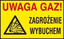 Znak ostrzegawczy w kształcie prostokąta o żółtym tle z napisem 